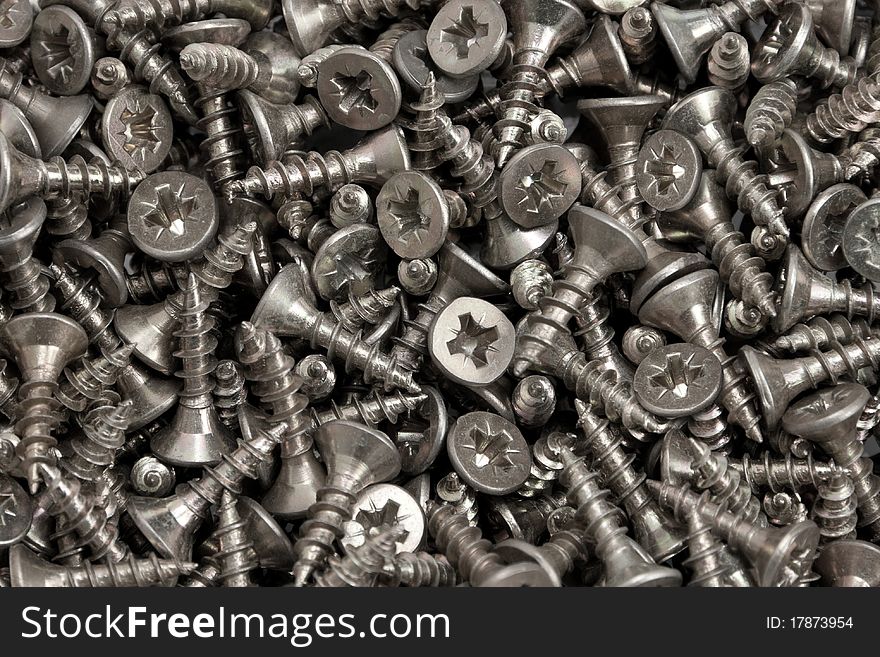 Background from set of metallic screws. Background from set of metallic screws