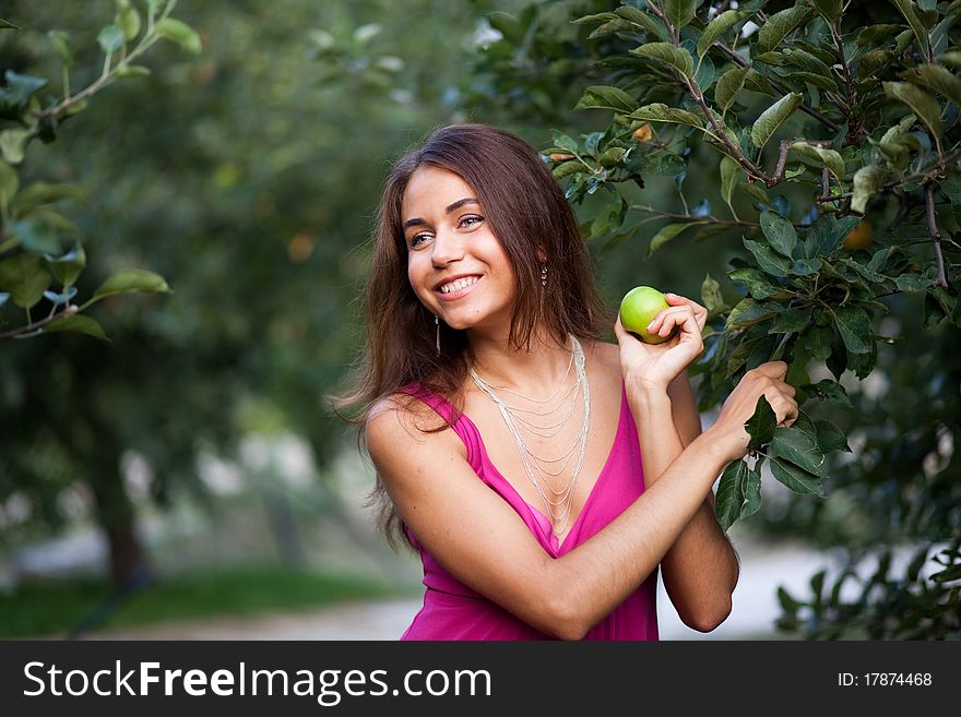 Beautiful Young Woman With Apple