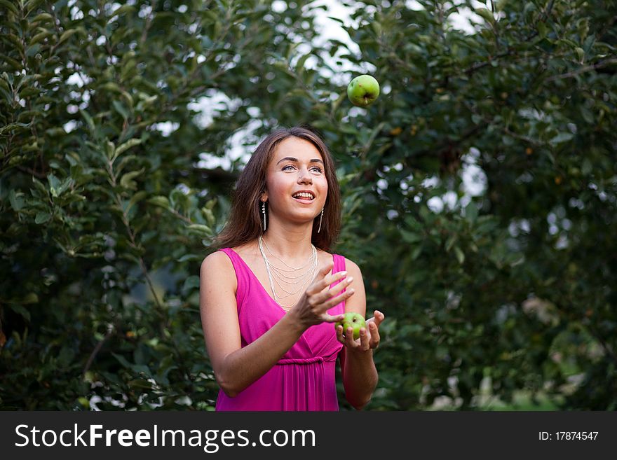 Beautiful Young Woman With Apple