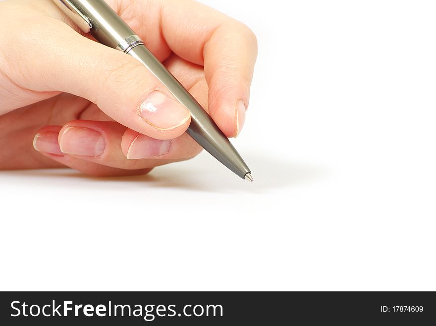 Hand holding pen isolated on white background