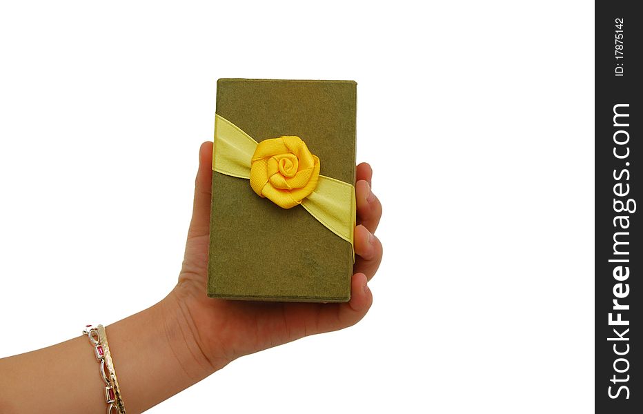 A green box tied with a yellow