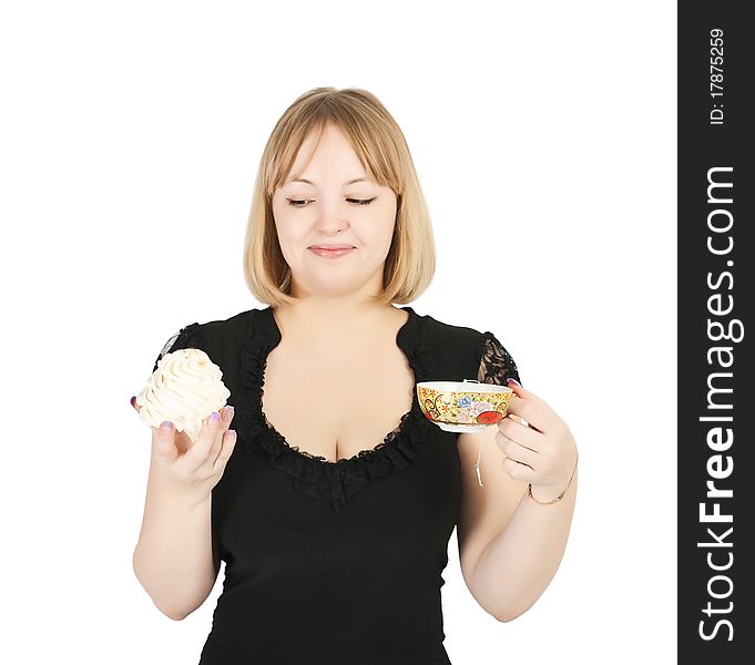 Beautiful young girl who holds in one hand a sponge cake