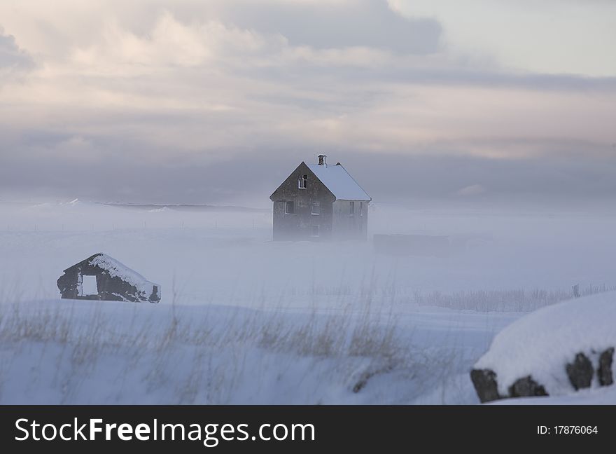 House in a Fog and Snow in Iceland. House in a Fog and Snow in Iceland