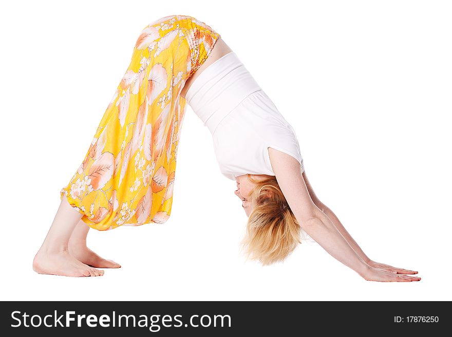 Young woman doing yoga exercise. isolated