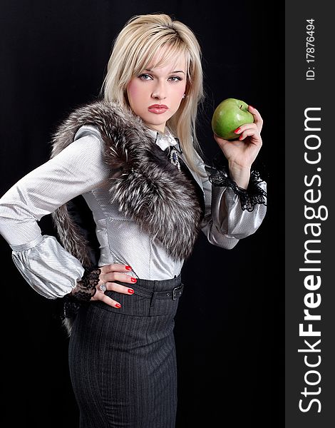 Girl in fur with apple. Girl in fur with apple