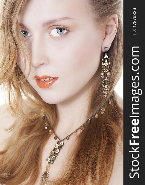 Portrait of elegant beautiful woman wearing jewelry.