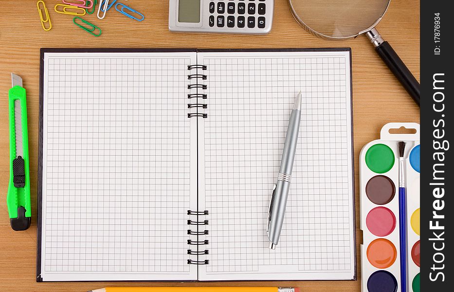 School Accessories And Notebook On Table