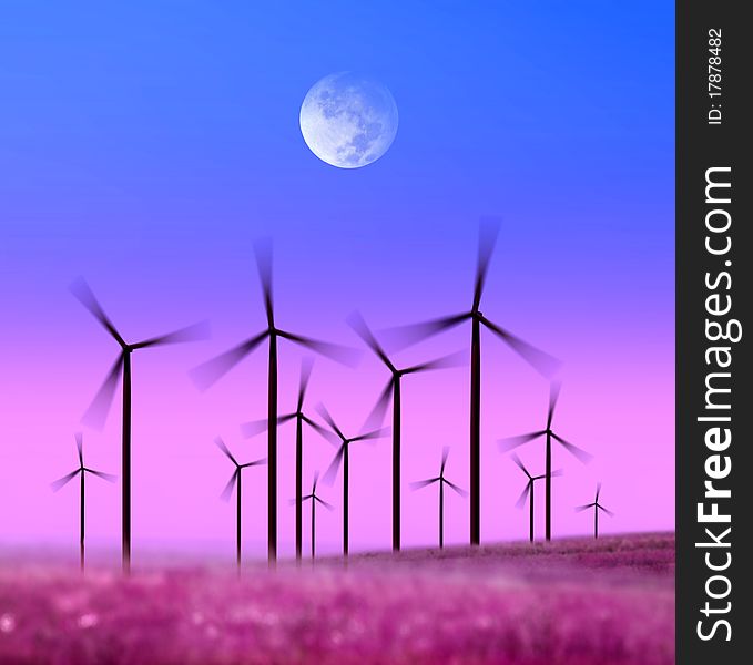 Silhouette of wind turbines generating electricity on night sky