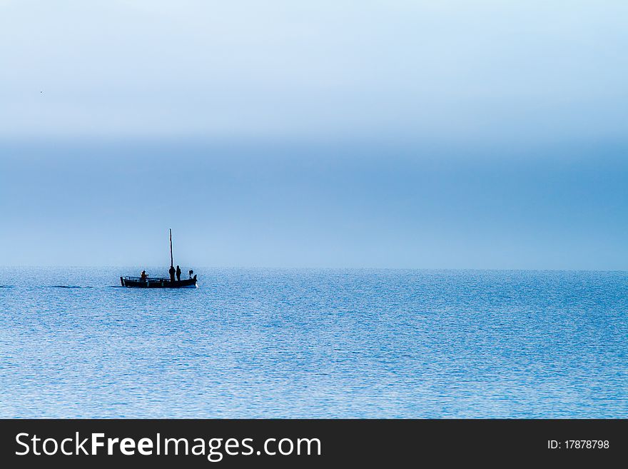 Silhouette of the fishing boat in the morning. Silhouette of the fishing boat in the morning