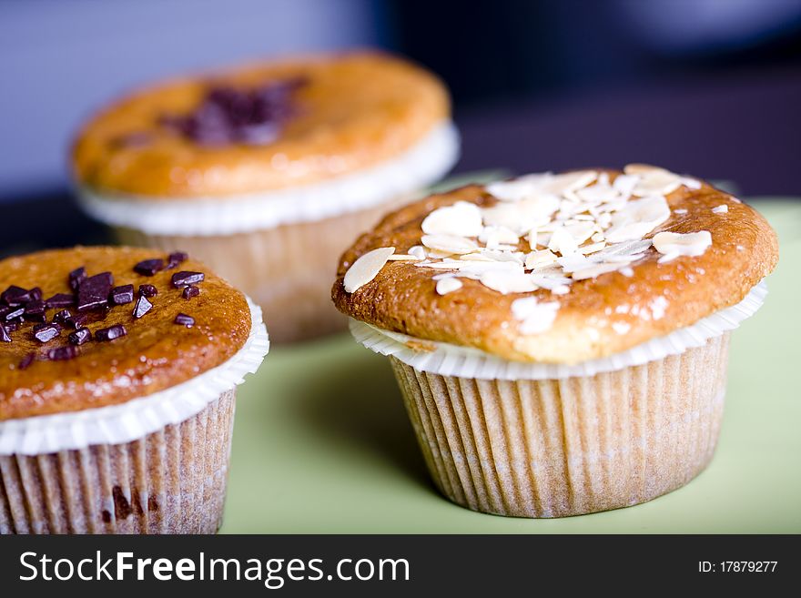 Fresh chocolate chip muffins . Macro with shallow dof.