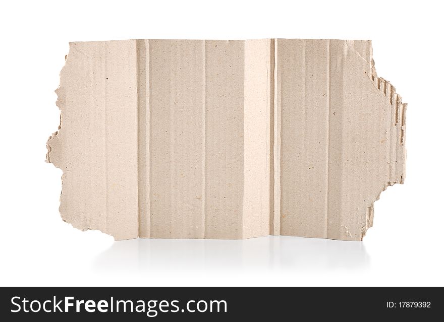 Torn blank cardboard, casting natural shadow on white. Ready for your message. Torn blank cardboard, casting natural shadow on white. Ready for your message.