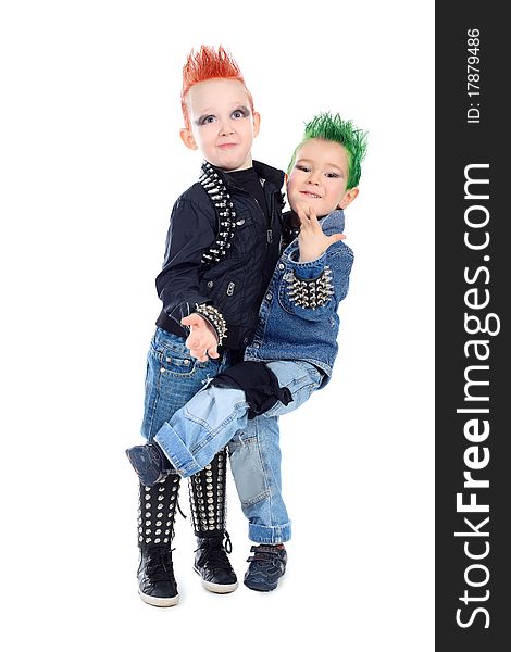 Shot of two little boys posing in costumes of rock musicians. Isolated over white background. Shot of two little boys posing in costumes of rock musicians. Isolated over white background.