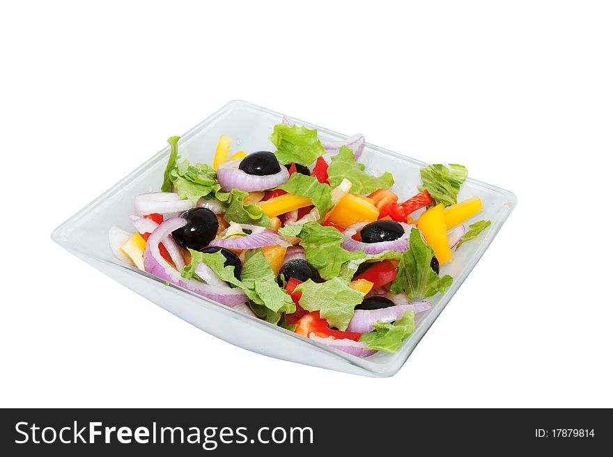 Salad of sweet peppers, lettuce, olives and onions on a square platter. Salad of sweet peppers, lettuce, olives and onions on a square platter