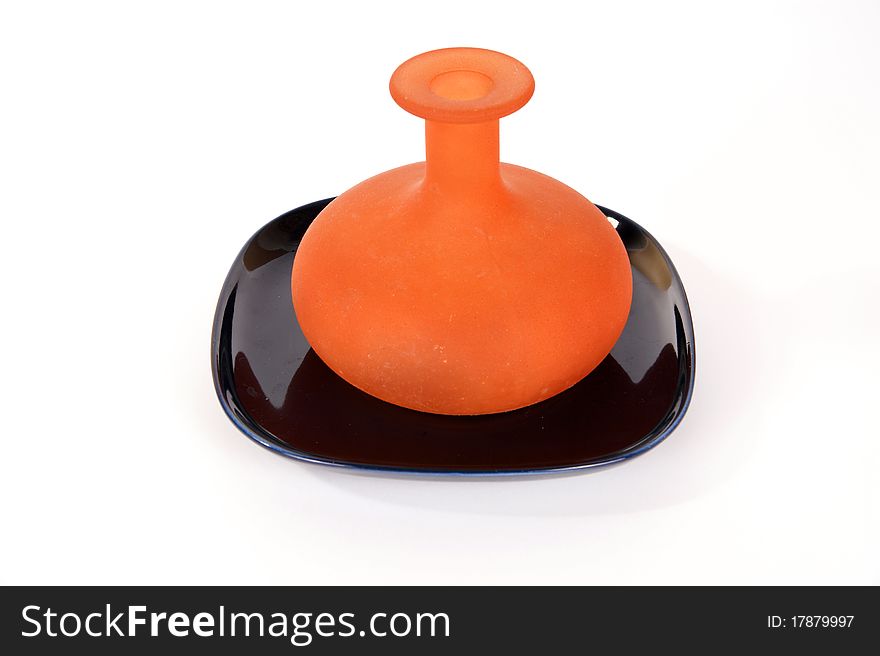 Colored glass vases on a white background