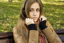 Young Woman With Headphones In The Park Royalty Free Stock Image Young Woman With Headphones In The Park Royalty Free Stock Image