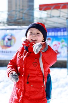 Asian Boy Is Playing Snow Royalty Free Stock Photo