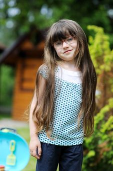 Girl With Long Hair Play With Toy Royalty Free Stock Photography