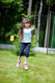 Active Little Girl With Long Dark Royalty Free Stock Photography Active Little Girl With Long Dark Royalty Free Stock Photography