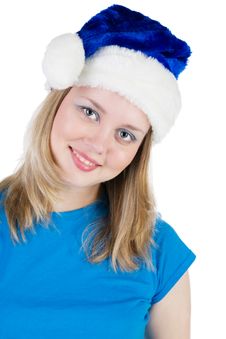 Girl In The Hat Of Santa Claus Stock Photos