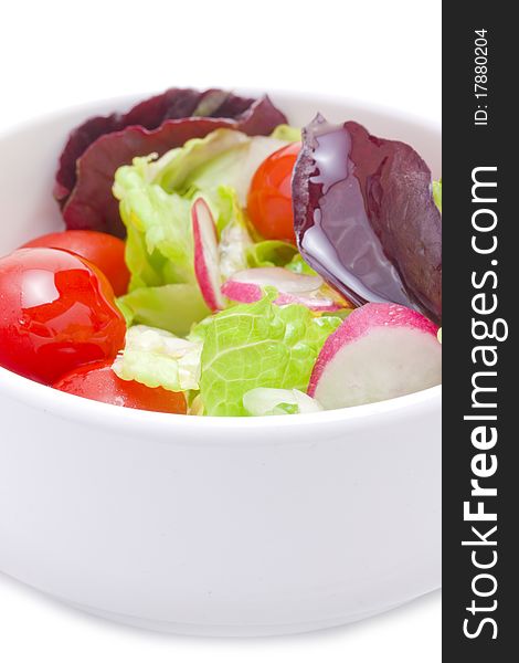 Fresh spring salad in bowl with vinegar dessing. Fresh spring salad in bowl with vinegar dessing