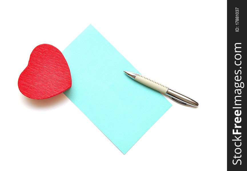 Blank paper for your text and red gift box in heart shape on white