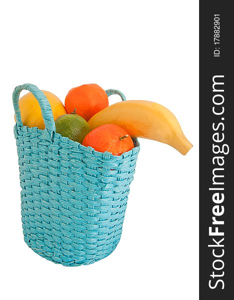 Fresh fruit in the basket isolated on white