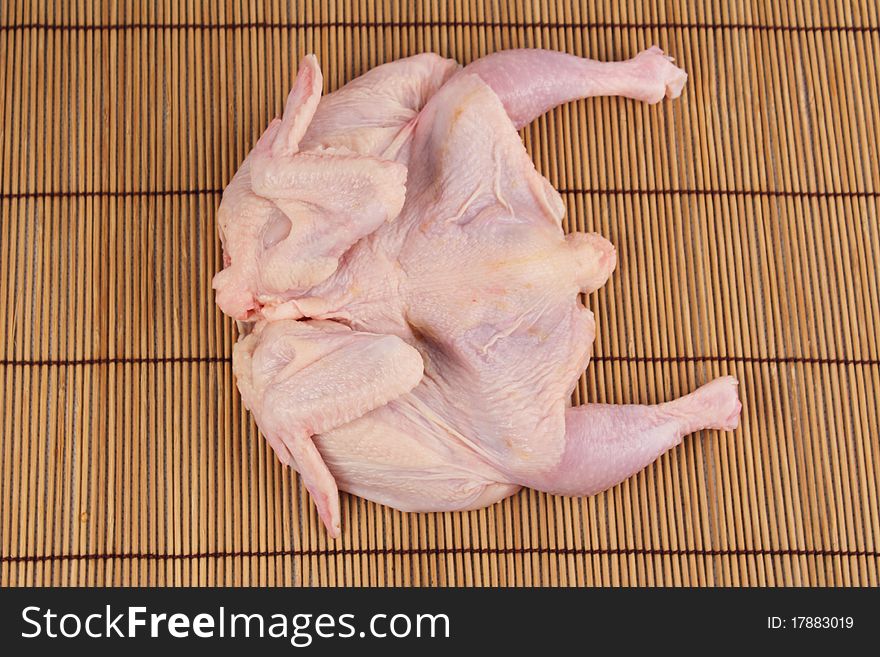 Raw chicken for roasting on the barbecue
