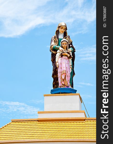 Madonna sculpture on roof in thailand. Madonna sculpture on roof in thailand