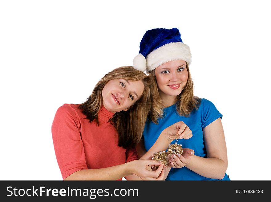 Two smiling girls with Christmas tree balls