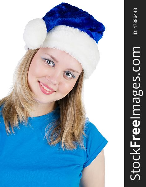 Portrait of a beautiful girl in the hat of Santa Claus, isolated on white