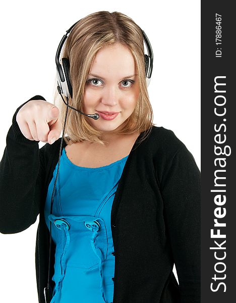 Beautiful young smiling cheerful woman with headphones with microphone pointing with finger on camera. Isolated on white. Beautiful young smiling cheerful woman with headphones with microphone pointing with finger on camera. Isolated on white.