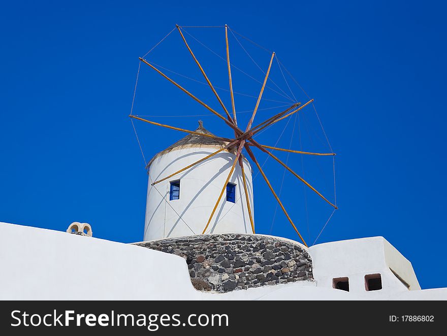 Santorini windmill, Oia, Greece - vacation background