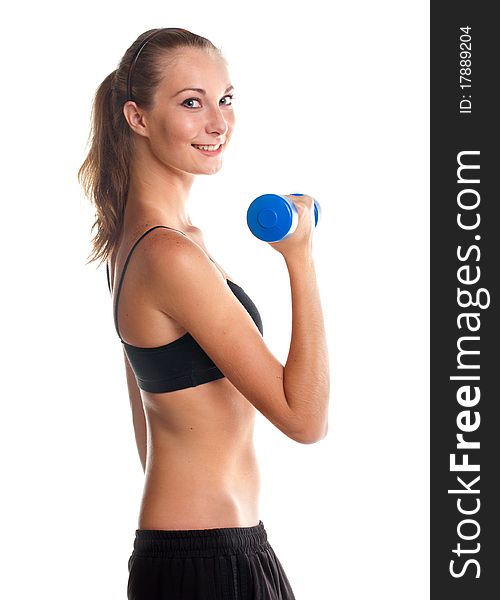 Smiling young girl doing fitness exercises