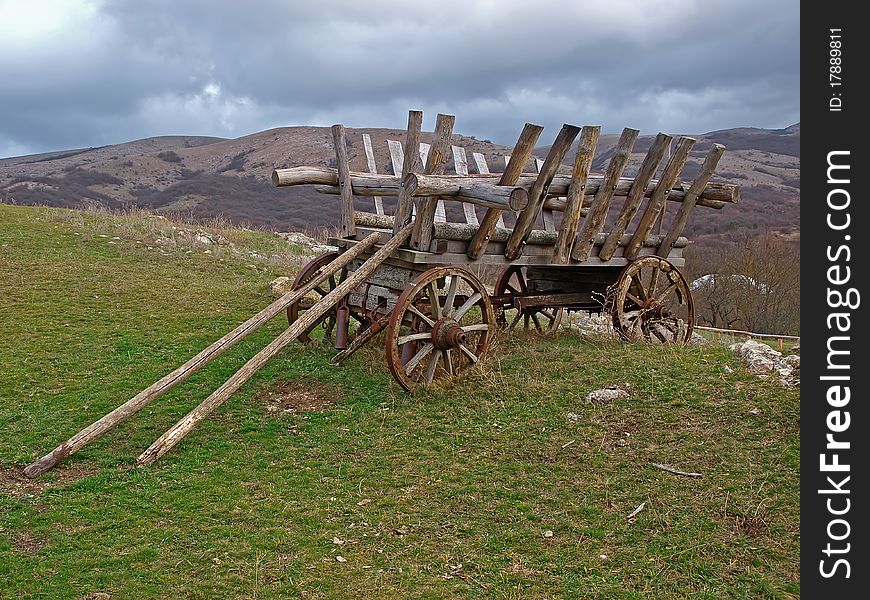 An old wooden cart in the mountains of Crimea, Ukraine. An old wooden cart in the mountains of Crimea, Ukraine
