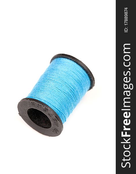 Blue thread isolated on white background