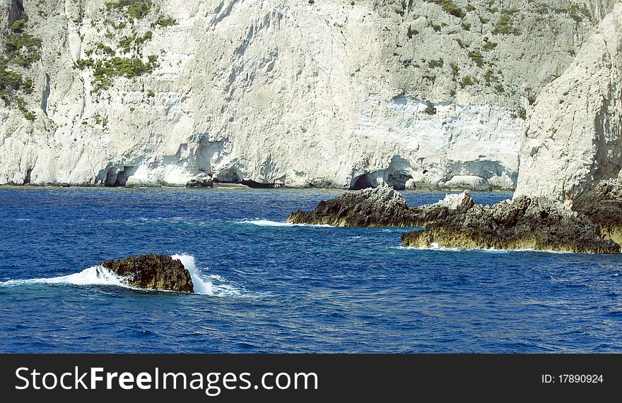 Sharp rocks that come out of water - danger for boats