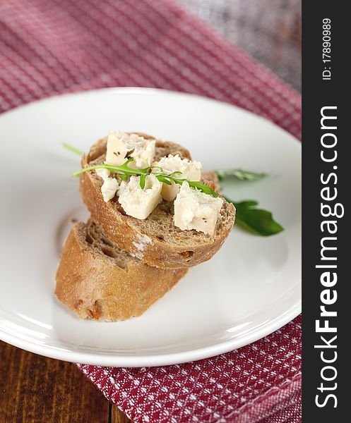 Baguette bread with feta cheese for appetizer. Baguette bread with feta cheese for appetizer