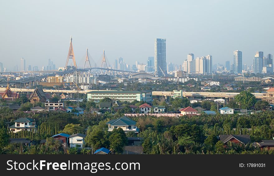 Various views of buildings and bridges across the river in Bangkok