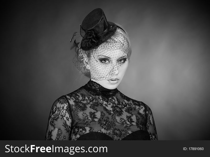 Monochrome portrait of elegant woman, studio close up shot