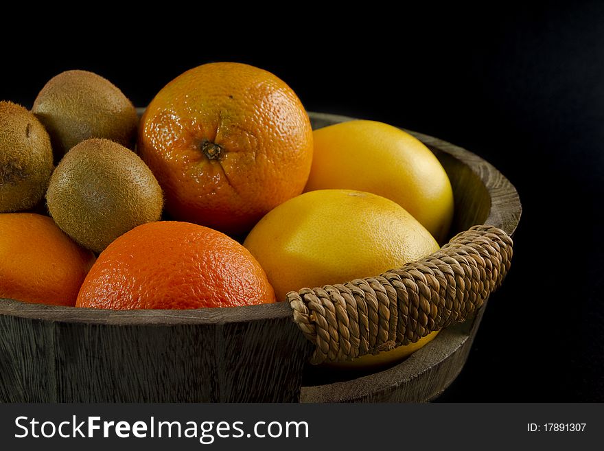 Tropical fruits on a black background