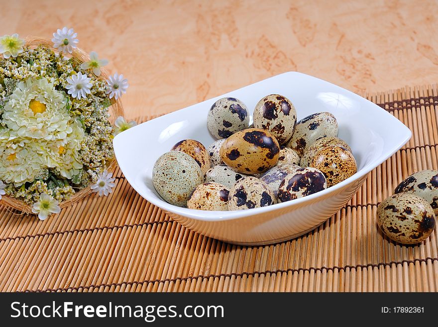 Quail eggs with Easter decorations.