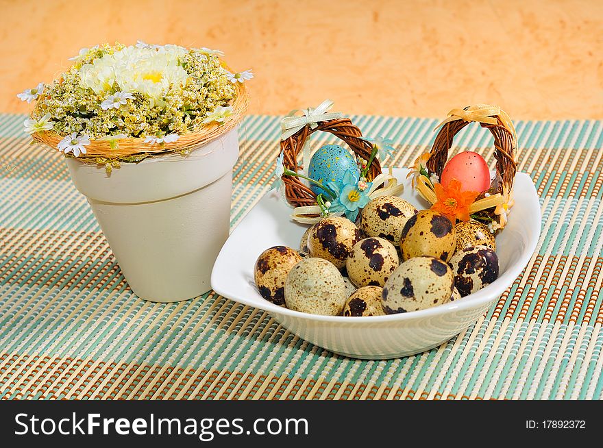 Quail eggs with Easter decorations.