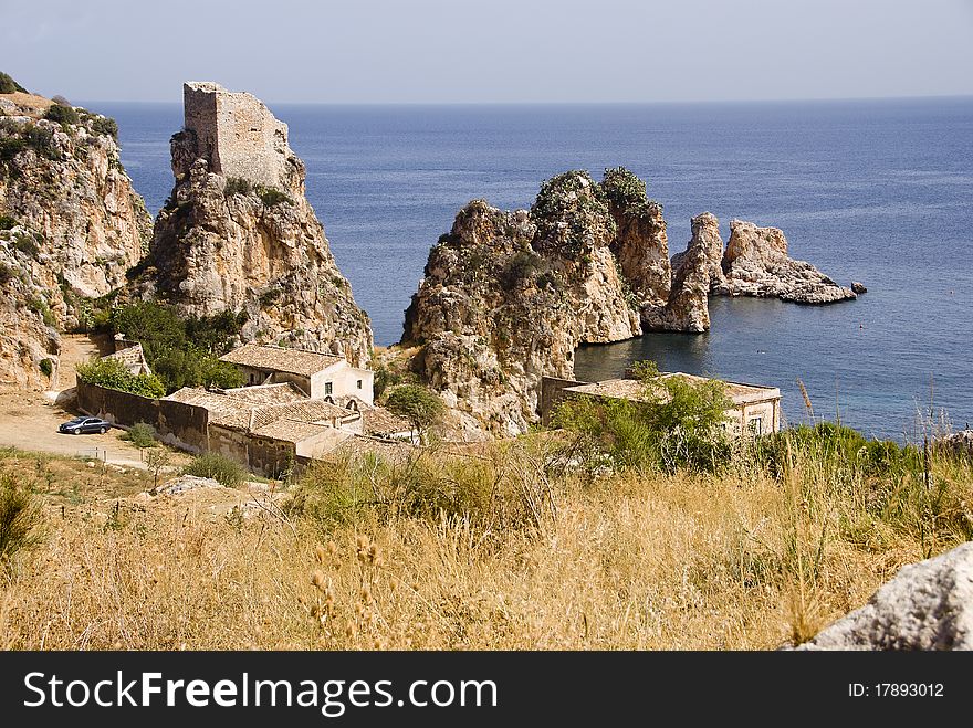 An old Sicilian farm surrounded by rocks