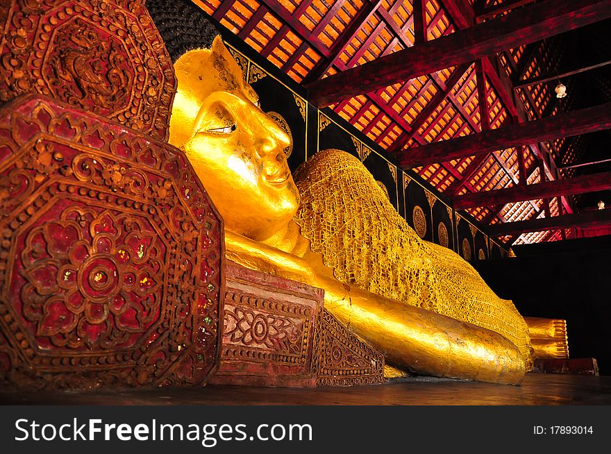 Lying Golden Buddha in Chiangmai Thai temple. Lying Golden Buddha in Chiangmai Thai temple