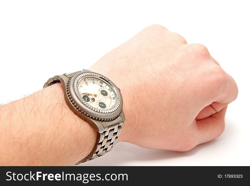 Wristwatch on the hand on a white background