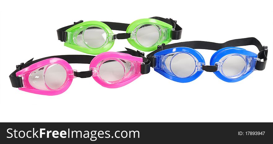 Three color swimming glasses over white background. Three color swimming glasses over white background.