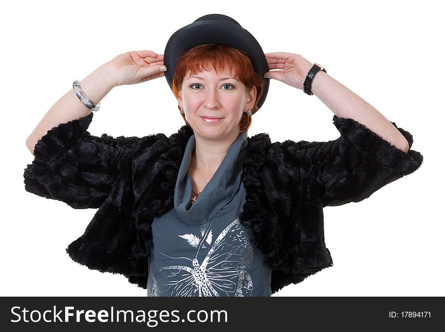 Girl in the bowler hat and a fur coat