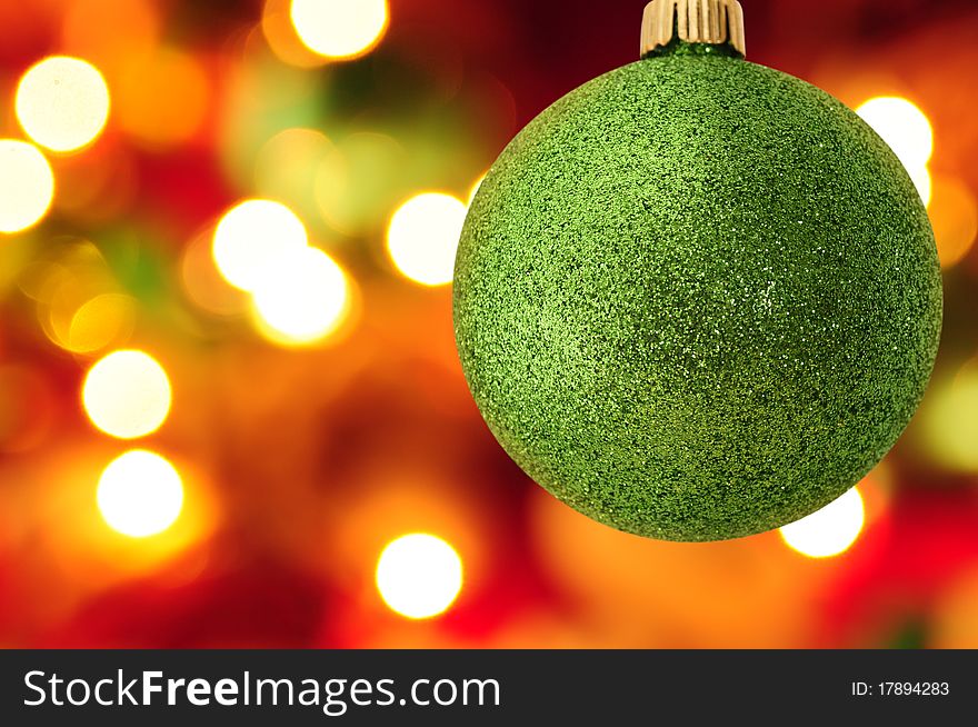 Christmas ball with blurred light in the background. Christmas ball with blurred light in the background.