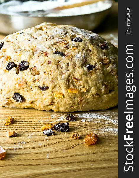 Raw dough for traditional German Christstollen with dried fruit. Raw dough for traditional German Christstollen with dried fruit.