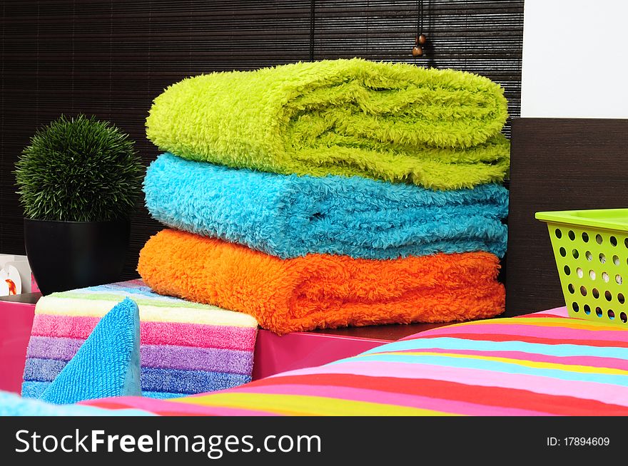 Vibrant color of a folded bath towels. Vibrant color of a folded bath towels.